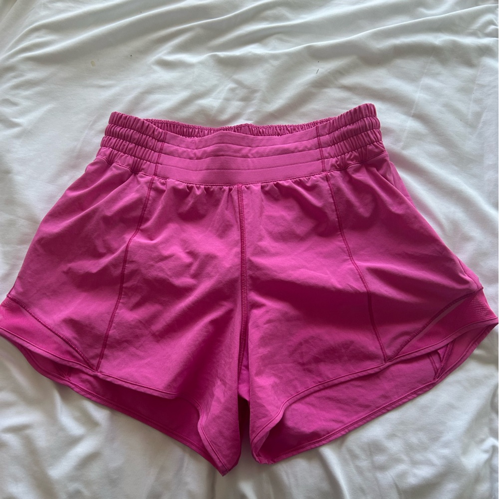 Lululemon sonic pink hotty hot high rise 4 inch size 8.